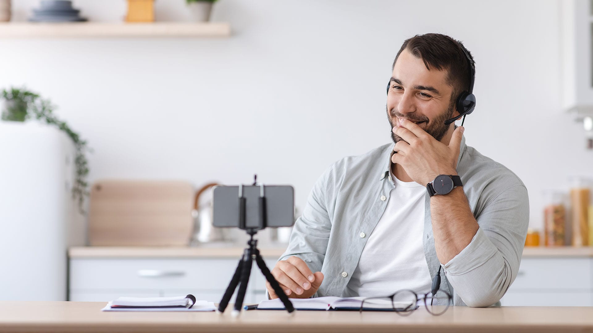 Man in San Carlos, CA attending a 3-hour online therapy session with a clinician via video call.